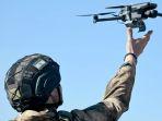 seorang-prajurit-rusia-di-distrik-militer-pusat-ambil-bagian-dalam-pelatihan-operator-drone.jpg
