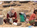 seorang-wanita-palestina-di-deir-el-balah.jpg