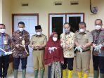 serah-terima-program-bedah-rumah-dari-pt-bank-mandiri-taspen-kepada-p.jpg