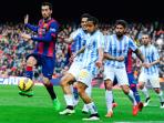 sergio-busquets-dikejarpemainmalaga_20150222_081559.jpg