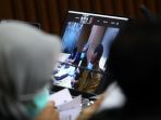 sidang-lanjutan-nurhadi-dan-rezky-herbiyono_20201118_175412.jpg