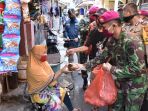 sinergitas-tni-polri-bantu-warga-terkena-dampak-covid-19_20200419_221858.jpg