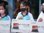 siswa-berprestasi-mendapat-bantuan-laptop.jpg