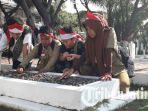 siswa-di-surabaya-ziarah-ke-taman-makam-pahlawan_20171031_141137.jpg