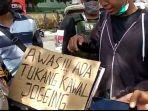 siswa-smk-dipulangkan-karena-membawa-poster-awas-ada-tukang-kawal-jogging.jpg