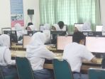 siswa-smkn-50-jakarta-jalani-unbk_20190325_203046.jpg