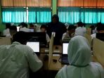 siswa-smpn-1-jakarta-ikuti-unbk_20190422_120806.jpg