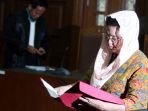 siti-fadilah-supari-jalani-sidang-di-p-tipikor_20170207_130405.jpg