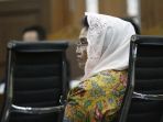 siti-fadilah-supari-jalani-sidang-perdana_20170206_180554.jpg