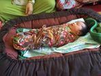 siti-jainah-melahirkan-bayi-tanpa-merasakan-hamil_1.jpg