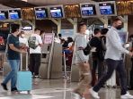 situasi-arus-mudik-nataru-di-bandara-soekarno-hatta-tangerang_20211223_184209.jpg