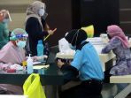 skrining-pedagang-pasar-tanah-abang-untuk-vaksinasi-covid-19_20210216_211730.jpg