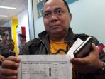 sony-setiawan-menunjukkan-boarding-pass-pesawat-lion-air-jt-610-yang-sudah-dicetaknya_20181029_144946.jpg