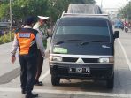 sosialisasi-aturan-ganjil-genap-kembali-diperlakukan_20200806_161511.jpg