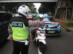 sosialisasi-jalur-kiri-untuk-pengendara-motor_20180126_144024.jpg