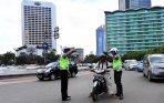 sosialisasi-larangan-motor-melintasi-jalan-thamrin_20141217_200046.jpg