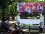 sosialisasi-pencegahan-covid-19-di-pemakaman_20200521_195328.jpg