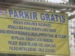 spanduk-indomaret-soal-ajakan-mela.jpg