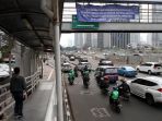 spanduk-sosialisasi-uji-coba-pembatasan-sepeda-motor_20170904_150041.jpg