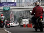 spanduk-sosialisasi-uji-coba-pembatasan-sepeda-motor_20170904_150254.jpg