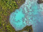 spot-pantai-dan-air-lautnya-yang-jernih-membiru-di-wayag-raja-ampat.jpg