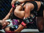 stamp-fairtex-mengalahkan-ritu-phogat.jpg
