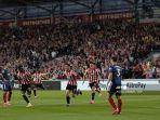 striker-brentford-spanyol-sergi-canos-tengah-merayakan-mencetak-gol.jpg