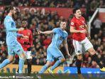 striker-burnley-chris-wood-merayakan-gol-yang-dicetak-ke-gawang-manchester-united.jpg