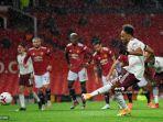 striker-gabon-arsenal-pierre-emerick-aubameyang-mencetak-gol-saat-lawan-manchester-united.jpg