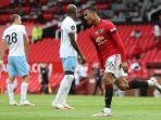 striker-inggris-manchester-united-mason-greenwood-merayakan-setelah-mencetak-gol-penyeimbang.jpg