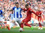 striker-liverpool-asal-brasil-roberto-firmino-melakukan-tembakan.jpg