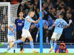 striker-manchester-city-erling-haaland-melakukan-selebrasi-setelah-mencetak-gol-pertama.jpg
