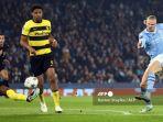 striker-manchester-city-erling-haaland-mencetak-gol-lawan-young-boys-liga-champions.jpg