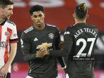 striker-manchester-united-inggris-marcus-rashford-tengah-diberi-selamat-alex-telles.jpg