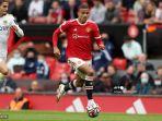 striker-manchester-united-inggris-mason-greenwood-dalam-perjalanan-untuk-mencetak-gol.jpg