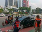 suasana-ganjil-genal-di-jalan-mh-thamrin.jpg