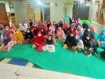 suasana-santunan-diberikan-kepada-sebanyak-30-anak-yatim-piatu-oleh-pengurus-yapira.jpg