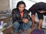 sugeng-terduga-pelaku-mutilasi-di-pasar-besar-malang-1652019.jpg