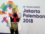 sugianto-raih-emas-tunggal-putra-nomor-seni-pencak-silat_20180829_133926.jpg
