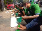 sukarelawan-ganjar-pranowo-yang-tergabung-dalam-komunitas-ojek-online-kajol.jpg