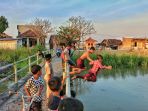 sungai-di-desa-purwosari-tempat-favorit-anak-anak-bermain_20201022_195132.jpg