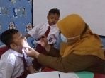 suntik-vaksinasi-covid-19-siswa-baru-sdn-periuk-1-tangerang_20220726_122235.jpg
