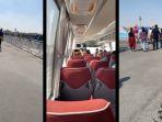 suporter-naik-bus-dan-berjalan-kaki-menuju-stadion-al-janoub.jpg