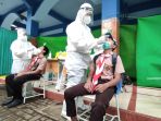 swab-test-pelajar-smp-di-surabaya-hari-kedua_20201127_033212.jpg