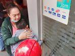 tangan-seorang-anak-terjepit-di-ruang-mesin-atm-di-kawasan-pesanggrahan-jakarta-selatan.jpg