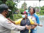tangkapan-layar-saat-seorang-warga-korban-banjir-di-dusun-beluk.jpg