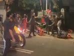 tangkapan-layar-video-aksi-pengeroyokan-yang-diduga-dilakukan-sekelompok-pemotor.jpg