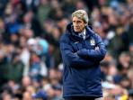 tatapan-tajam-manajer-manchester-city-manuel-pellegrini_20141204_165127.jpg