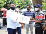 temui-pkl-di-solo-kemnaker-bagikan-bantuan-tkm.jpg