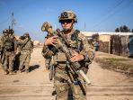 tentara-as-berpatroli-di-daerah-kota-tal-hamis-suriah-7868i98y.jpg